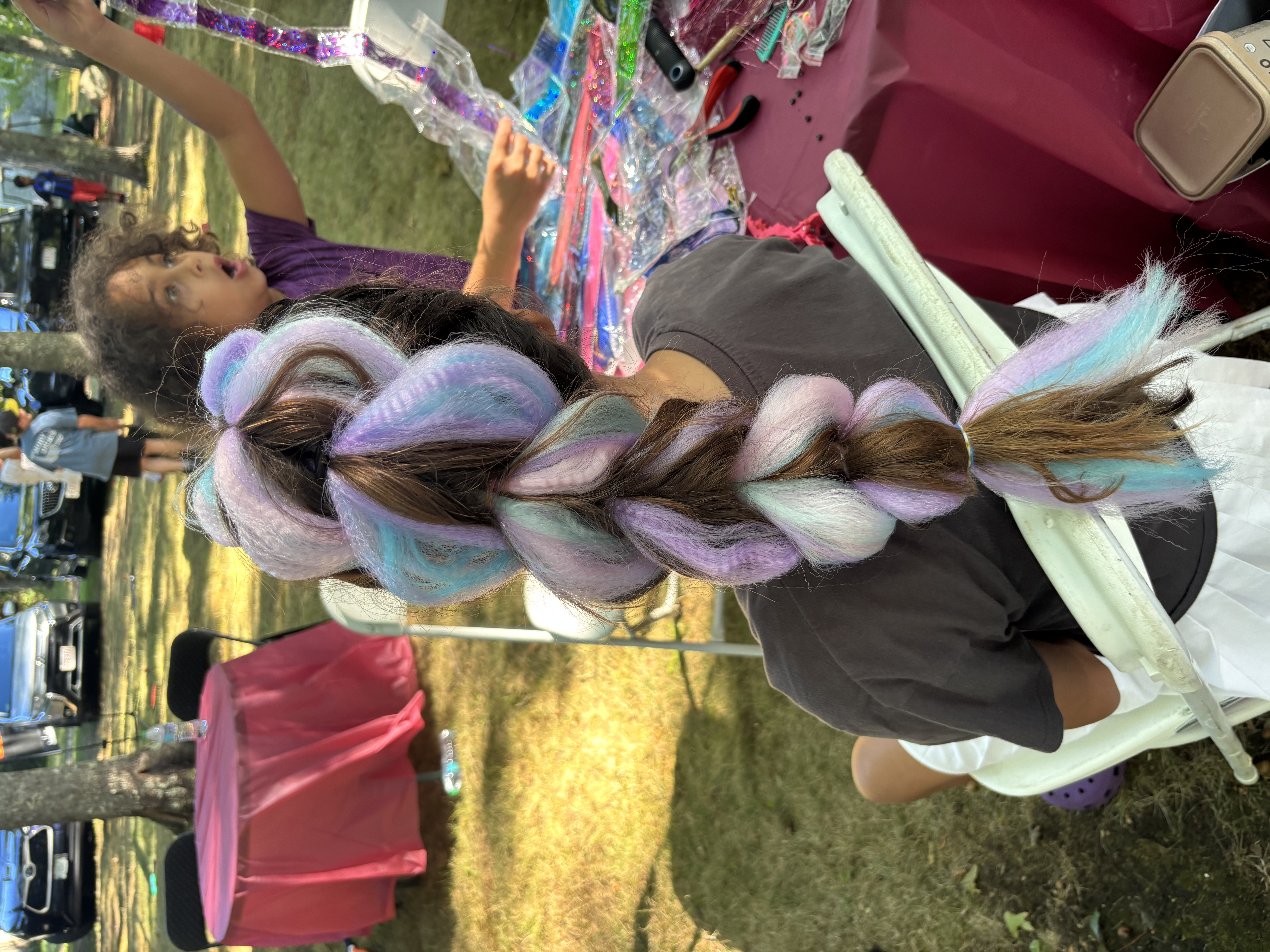 Hair styling tools and clippers arranged on a white background