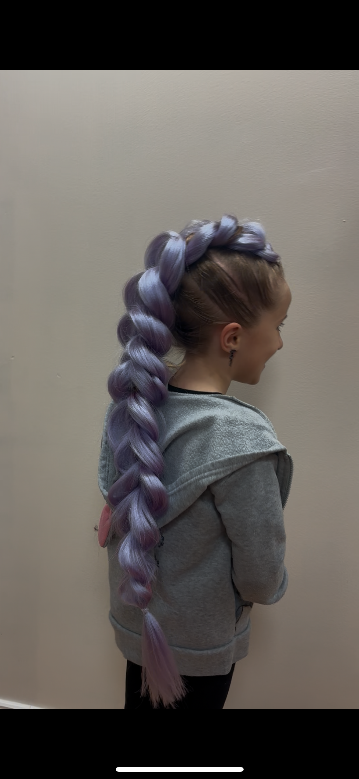 Extra-long braided hairstyle with lavender extension